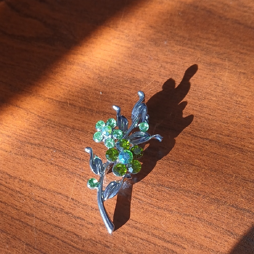 Elegant Silver and Green Floral Brooch